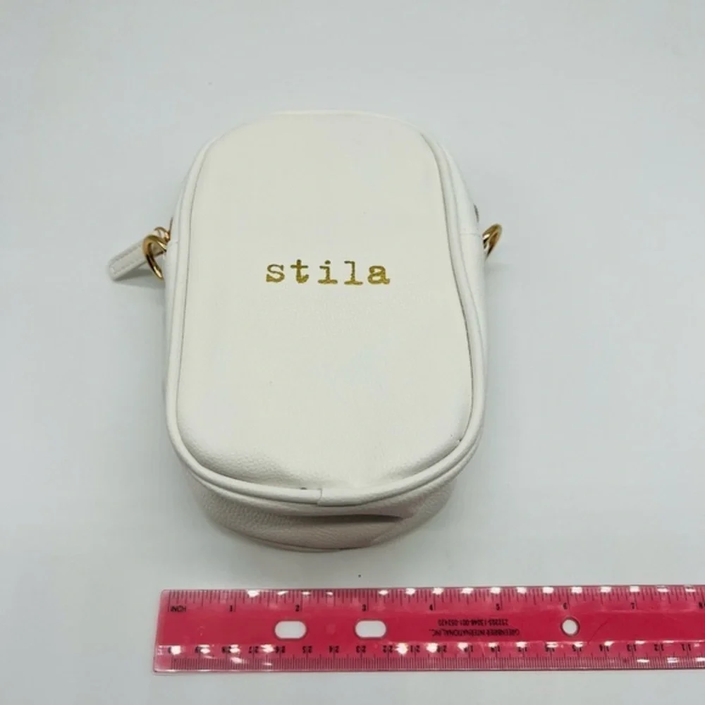 STILA white cosmetic crossbody bag